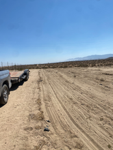 Load image into Gallery viewer, ❌SOLD/VENDIDO❌ Terreno de Venta en Adelanto por el 395 Electricidad Disponible - 2.5 acres - Pagos Disponibles